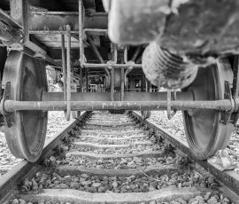 Museumseisenbahn Hanau e. V. Bahnbetriebswerk, Heideäcker 1, 63457 Hanau Fotos von Aloys Peter Trenz Nahaufnahme des Fahrwerks eines Güterzugs auf Schienen